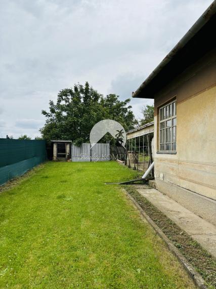 Reality Komplex s.r.o. ELADÁSRA kínál egy nagy telket régi vidéki házzal Nagylúdc községben!