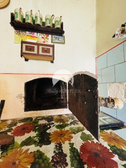 Reality Komplex s.r.o. ELADÁSRA kínál egy nagy telket régi vidéki házzal Nagylúdc községben!