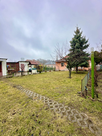 IBA U NÁS! Reality KOMPLEX s.r.o. vám ponúka na predaj priestranný rodinný dom v Komárome (Maďarsko) - fotografia 13