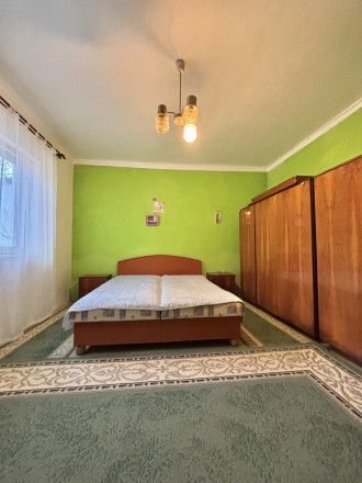 Reality KOMPLEX s.r.o.,Vám  ponúka starší  4 izbový rodinný dom  v pokojnej časti Mesta Komárno ! - fotografia 5